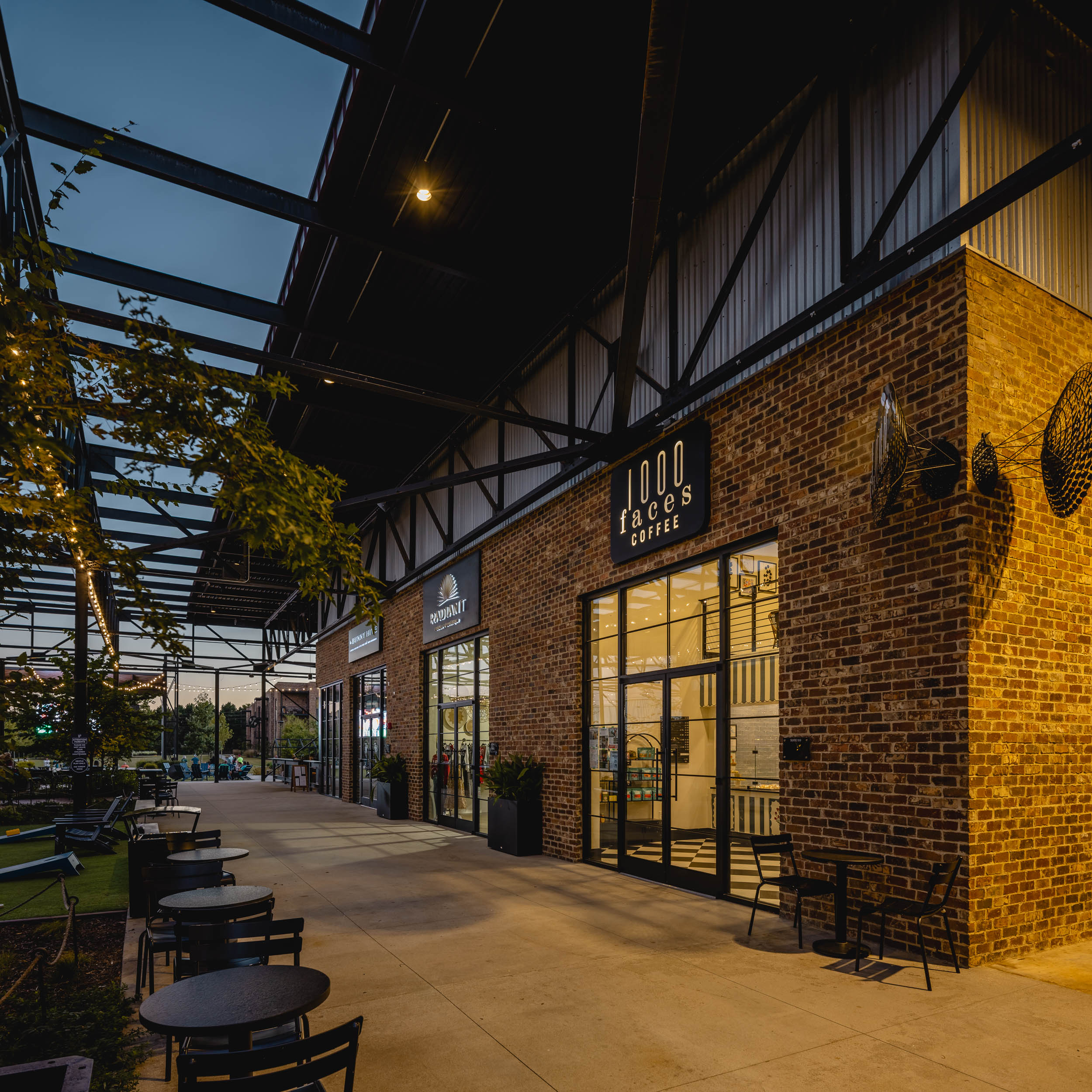 Wire Park storefronts at dusk