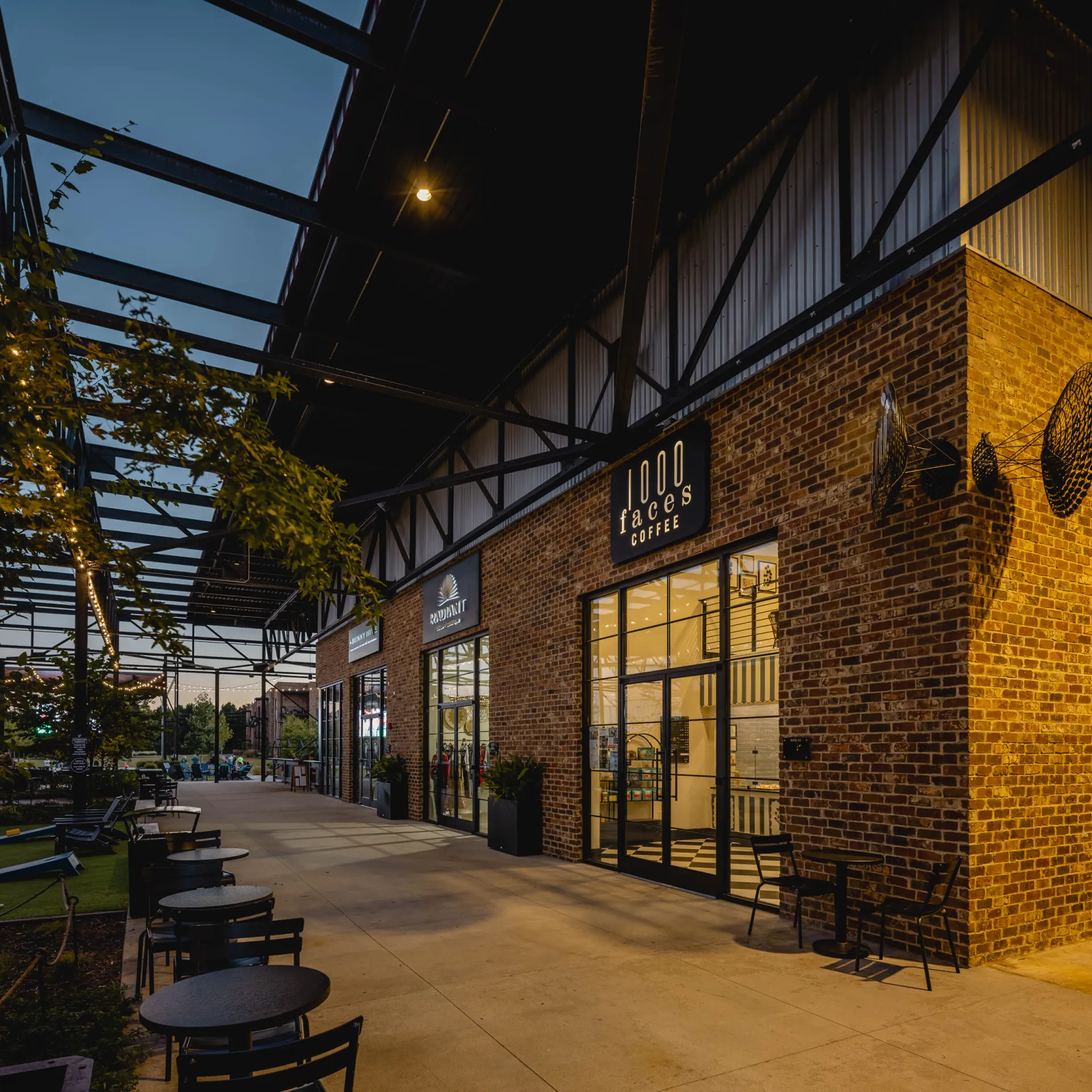 Wire Park storefronts at dusk